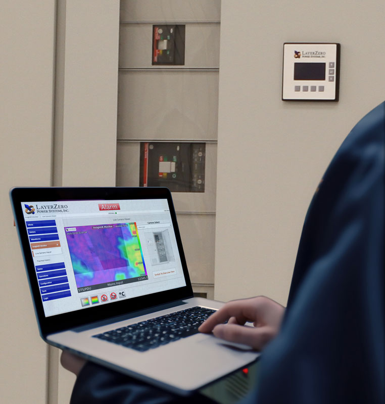 Technician reviewing INSIGHT IR® thermal data from outside the energized equipment