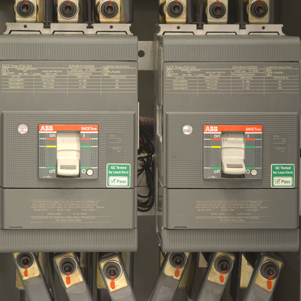 Two circuit breakers after being quality control tested by LayerZero