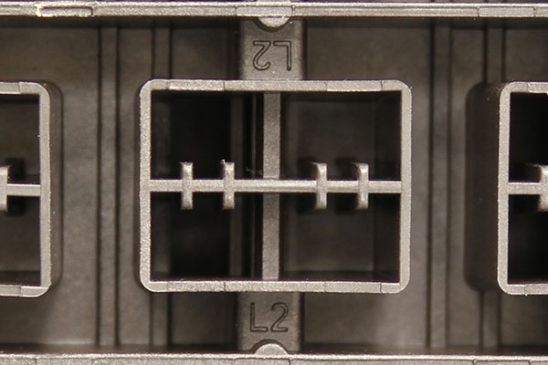 Close-up of SafePanel finger-safe bus interface preventing live bus exposure