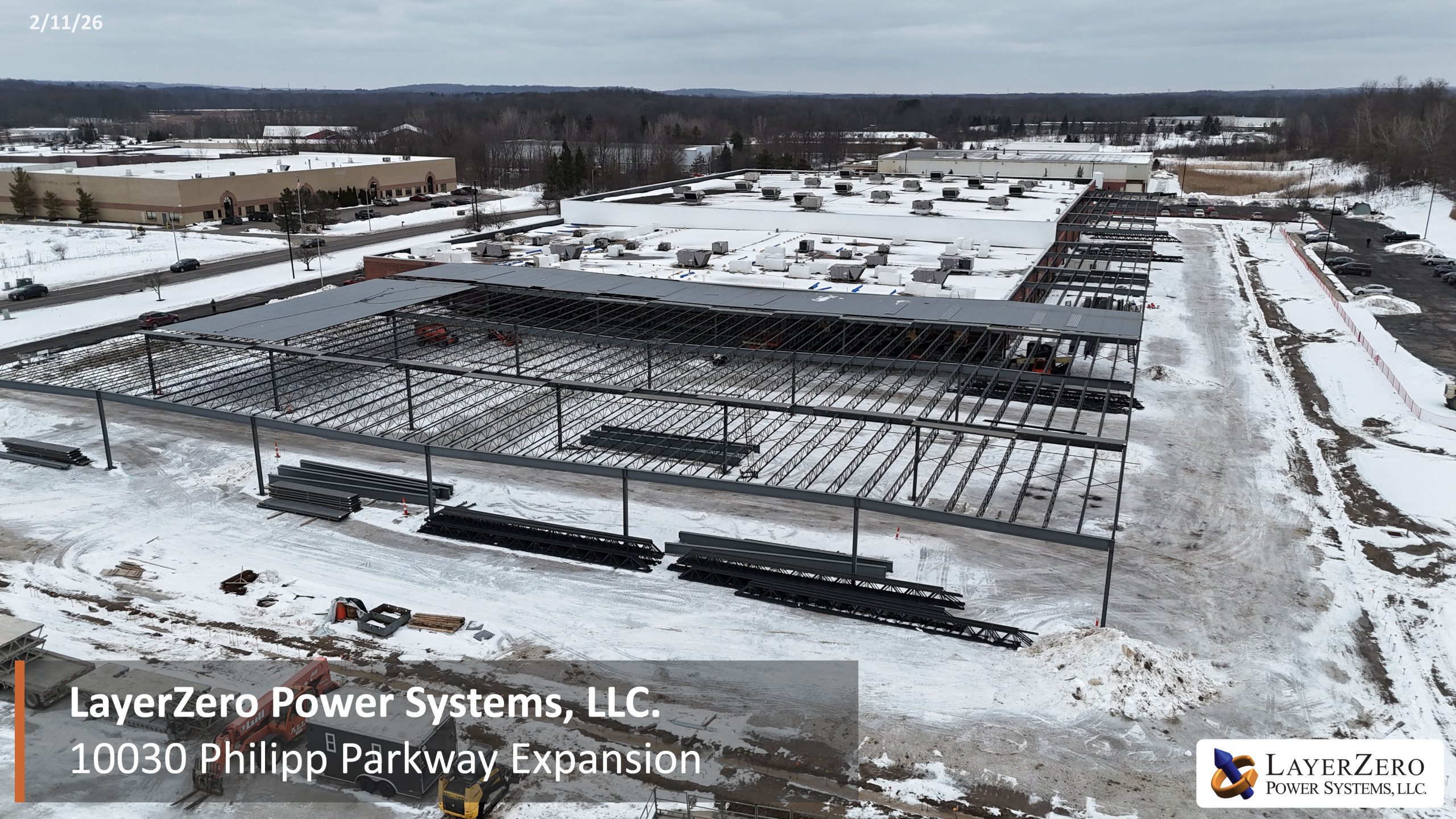 Drone aerial showing expanded steel framing structure at LayerZero Power Systems, LLC Philipp Parkway expansion site.