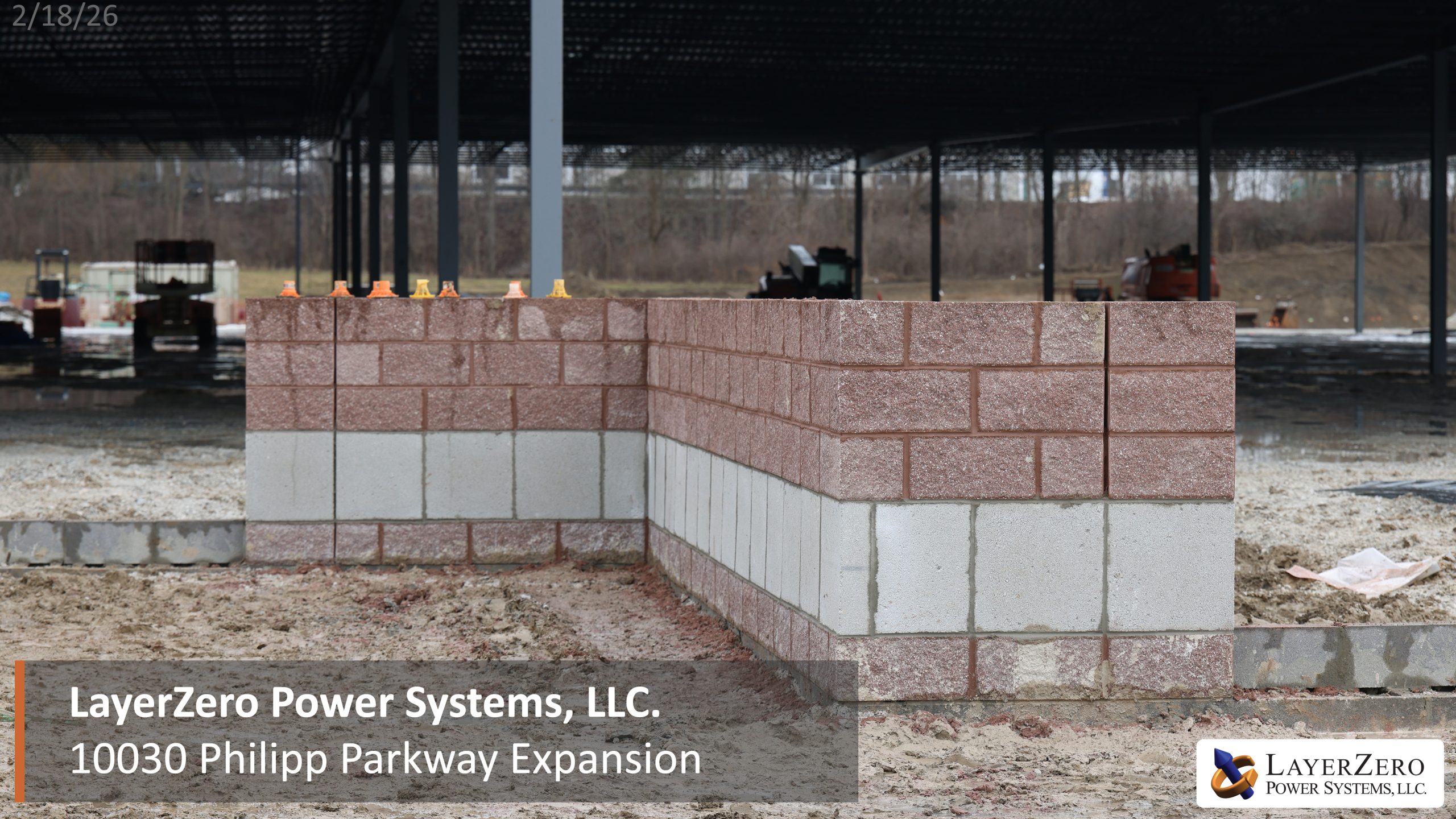 CMU block wall construction at LayerZero Power Systems facility expansion site