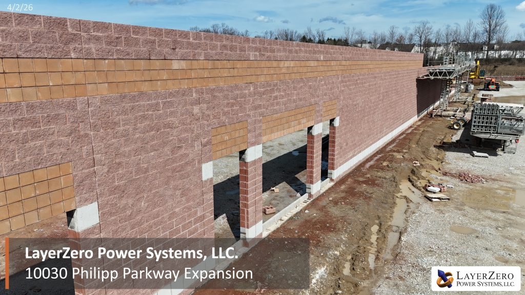Side view of the LayerZero Power Systems Philipp Parkway expansion showing masonry wall construction and structural openings