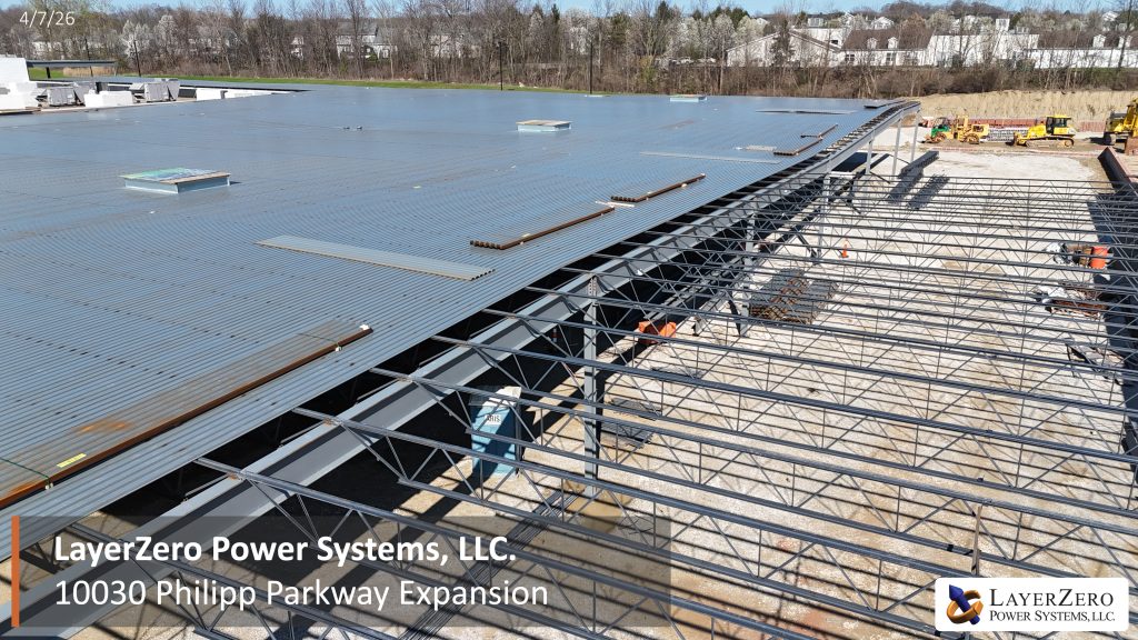 Roof deck and steel truss installation at LayerZero Power Systems expansion viewed from above