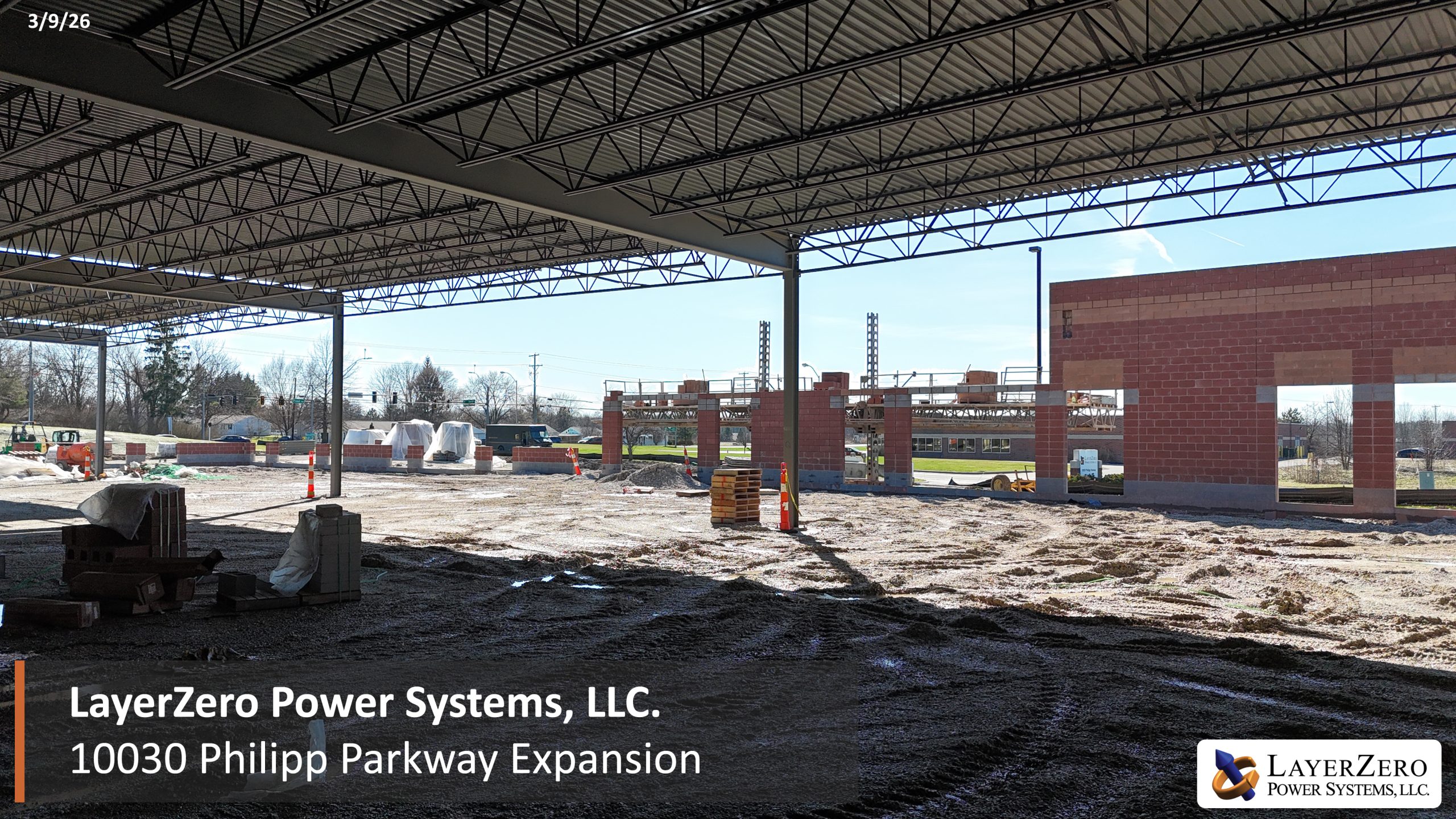 Interier view of the LayerZero Power Systems Philipp Parkway expansion rising masonry walls and roof construction