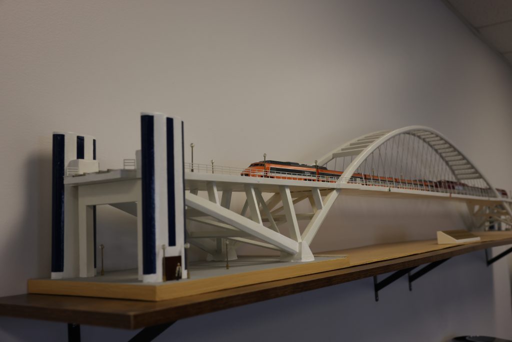 Scale train bridge model in the LayerZero Power Systems board room representing the LayerZero Bridge and the company mission of bridging the electrical connection gap