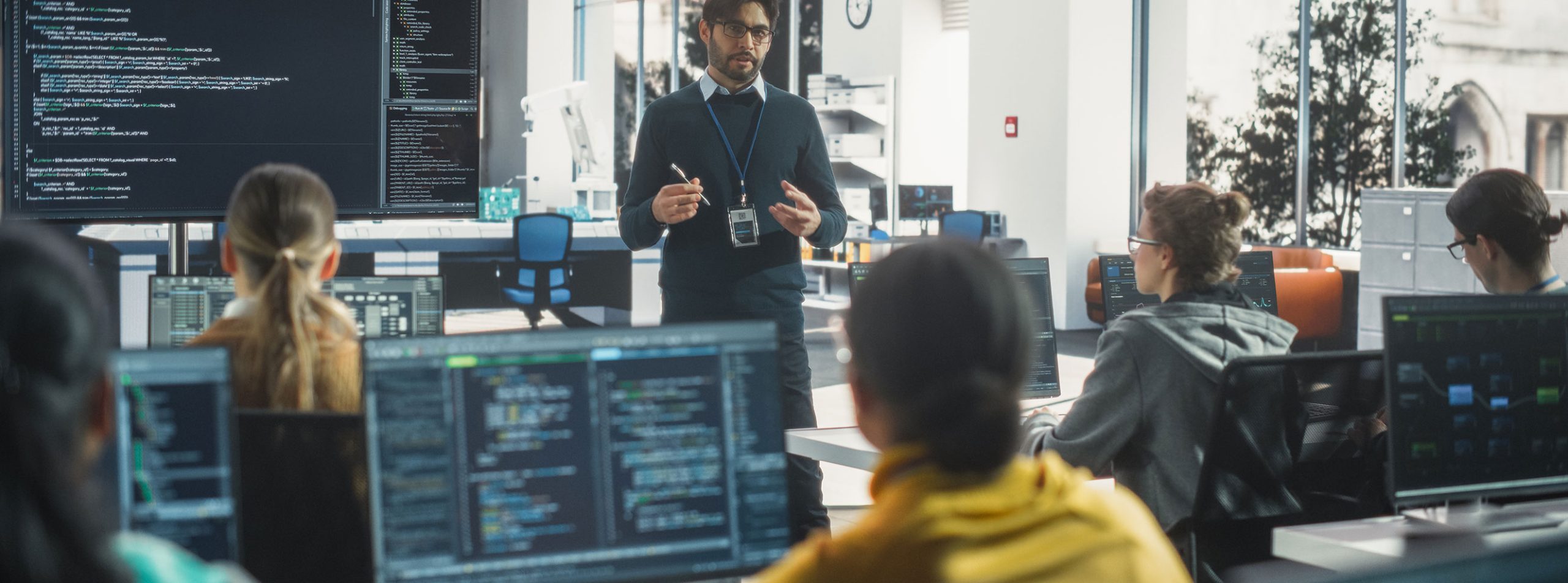 University researchers and IT staff working in a research computing environment requiring reliable, mission-critical power