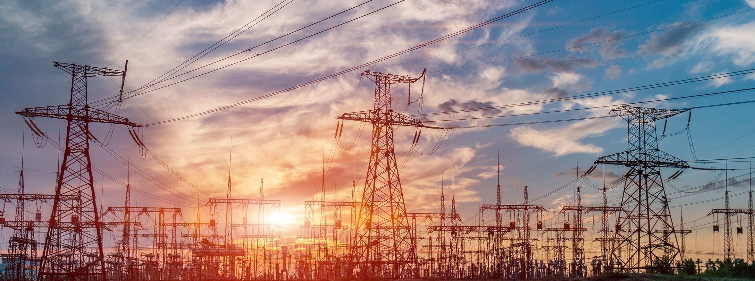 Electric utility transmission and substation infrastructure supporting reliable grid power and critical facilities