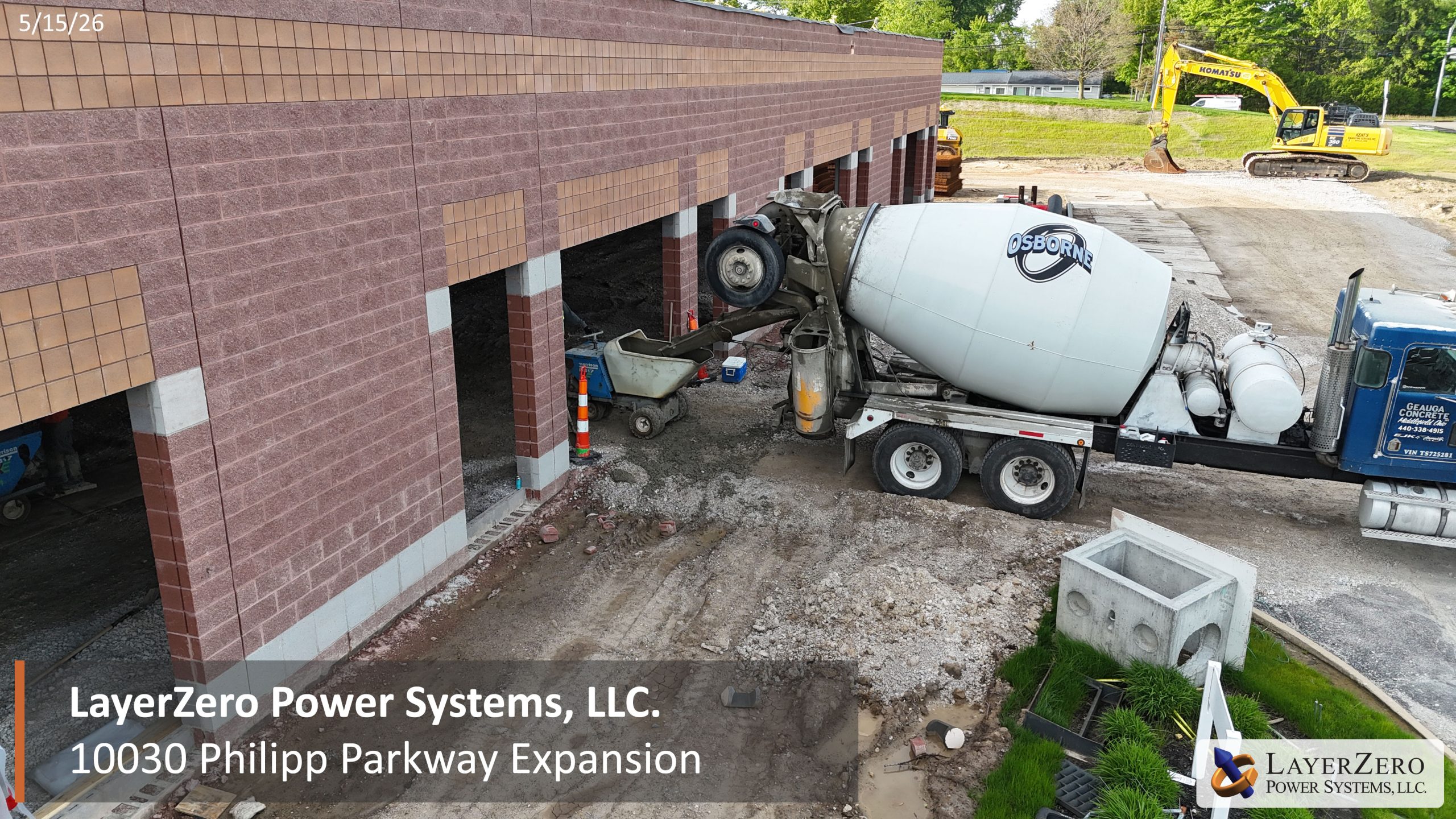 Concrete truck pouring concrete at the LayerZero Power Systems facility expansion project at 10030 Philipp Parkway