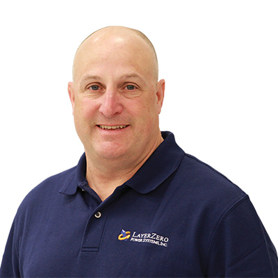 Rob from LayerZero Power Systems wearing navy company polo shirt